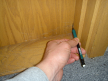 Marking Door With Pencil