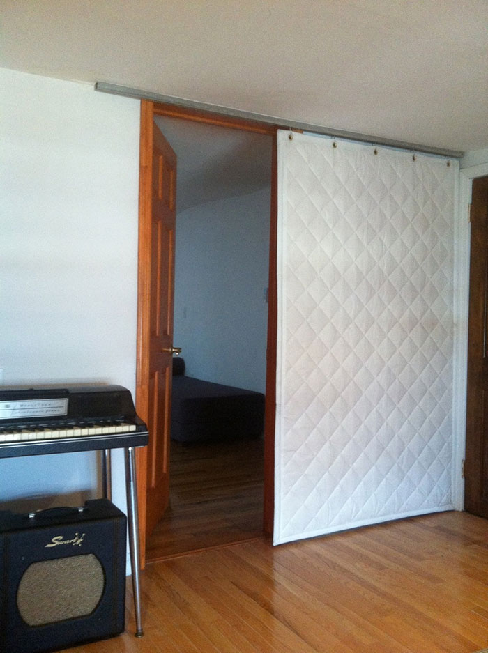 Quilted Curtain Covering Door