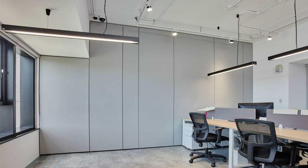 Fire safety rated Silk Metal™ wall panels being used in an office building