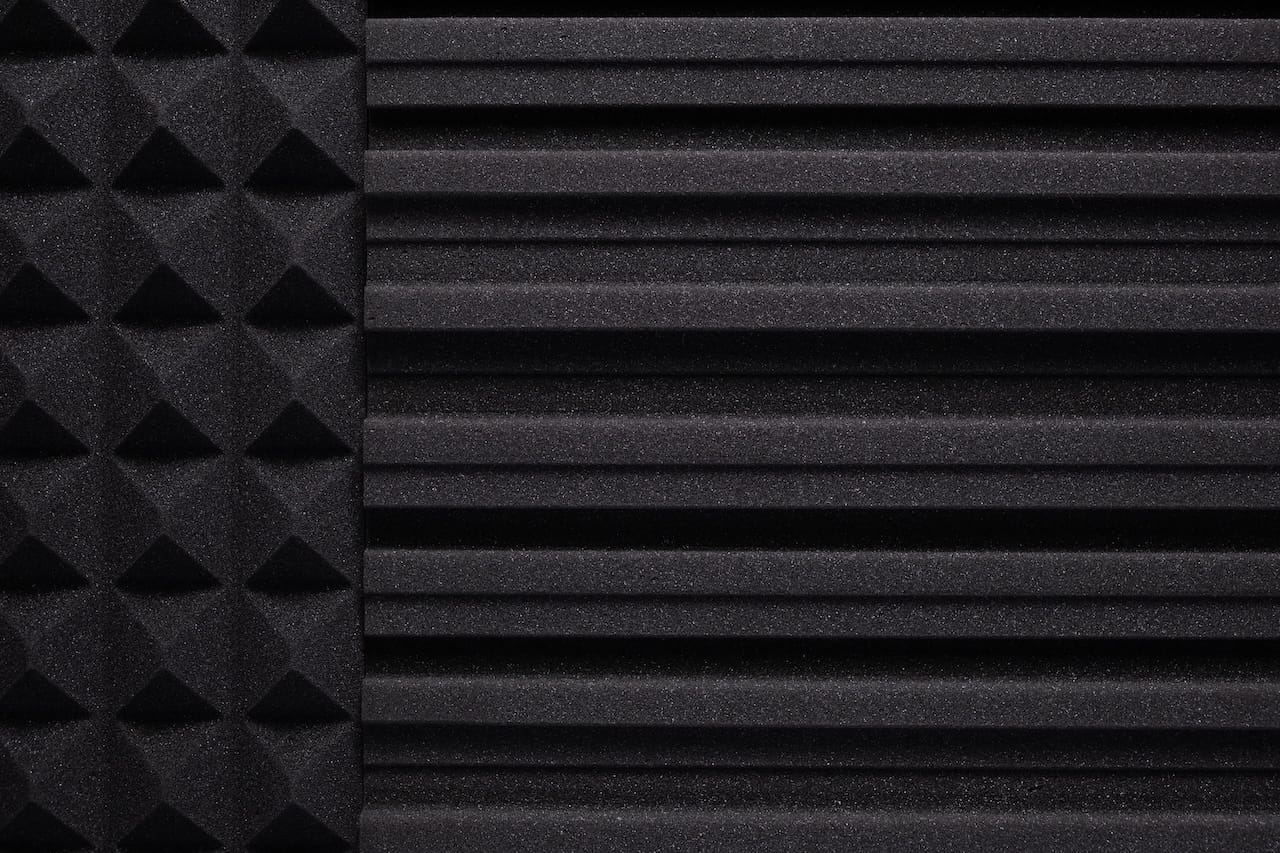 Acoustic foam wall background texture. Sound isolation material for soundproof in studio or house renovation