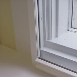 Climate Seal Window Insert by ASI Mounted on the Surface of Existing Window Frame